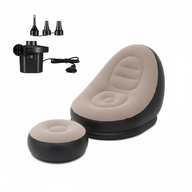 Inflatable chair with footrest and air pump on a white background